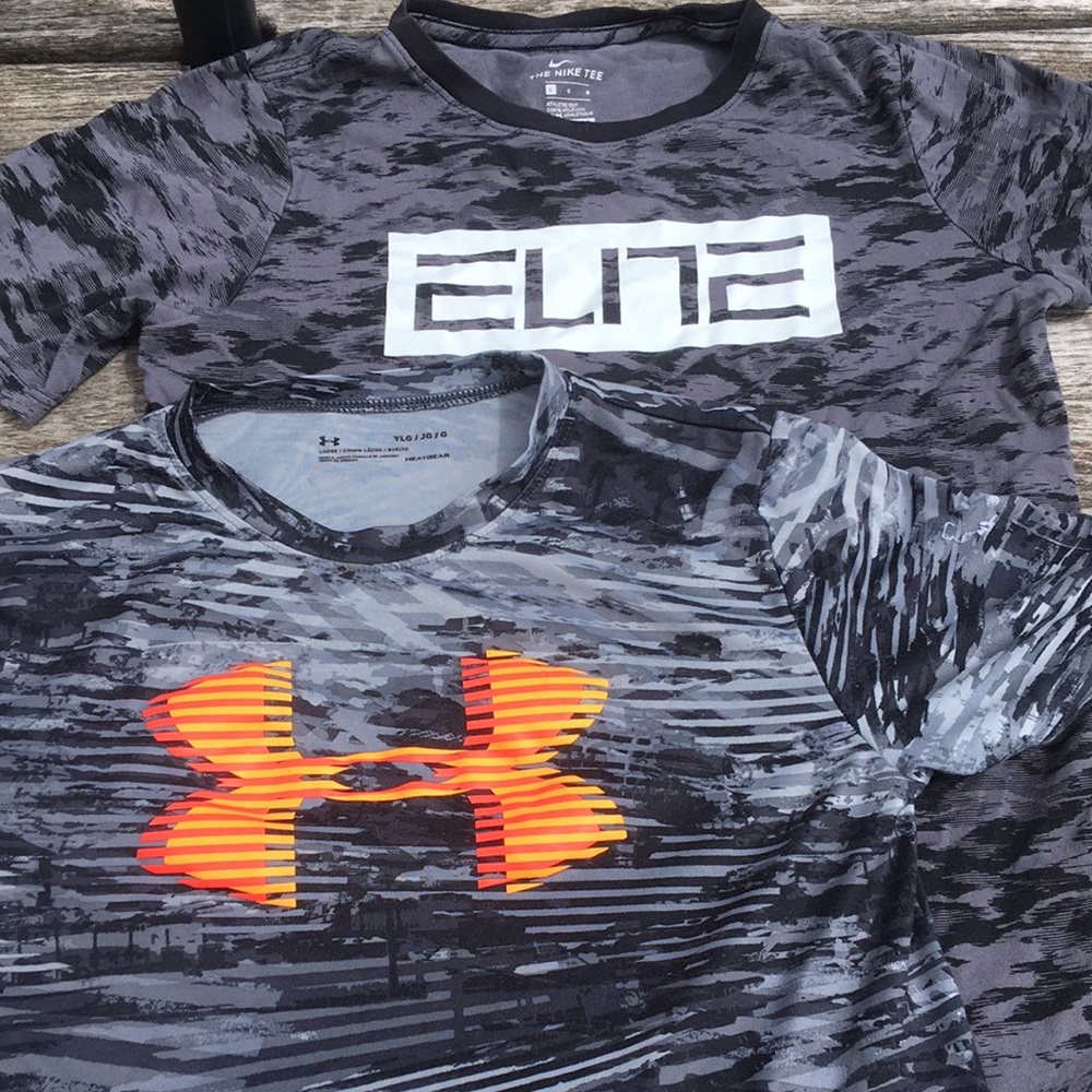 Two kids shirts. Nike Dri-Fit Large and Under Armour YLG
